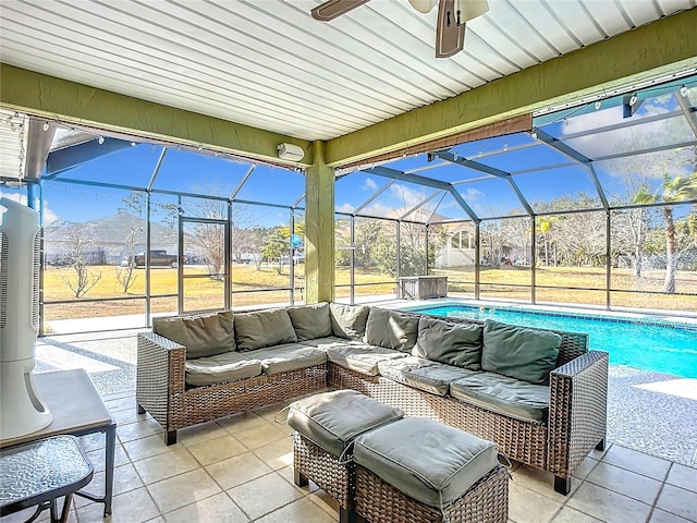 view of patio / terrace featuring an outdoor hangout area, a mountain view, and glass enclosure