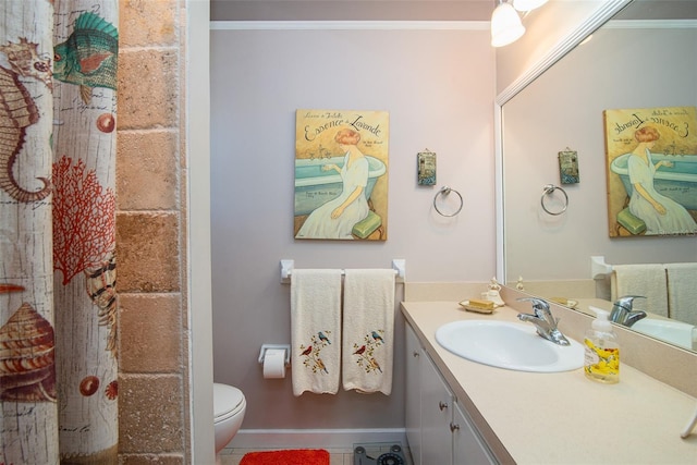 bathroom featuring ornamental molding, a shower, vanity, and toilet