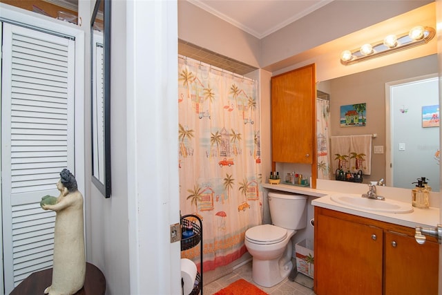 bathroom featuring vanity, tile patterned floors, crown molding, and toilet