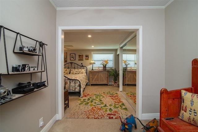 carpeted bedroom with crown molding