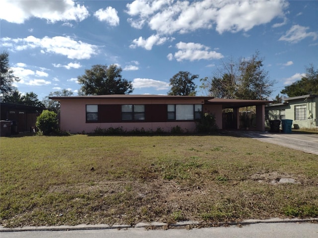 single story home with a carport and a front yard