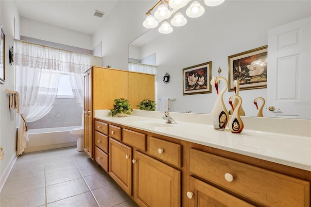 full bathroom featuring tile patterned floors, toilet, an inviting chandelier, shower / bathtub combination, and vanity