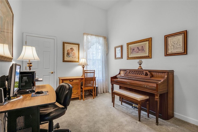 carpeted office with a high ceiling