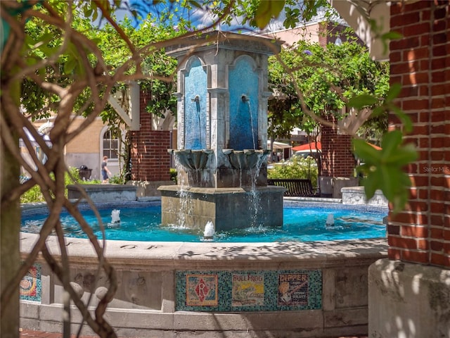 view of pool featuring pool water feature