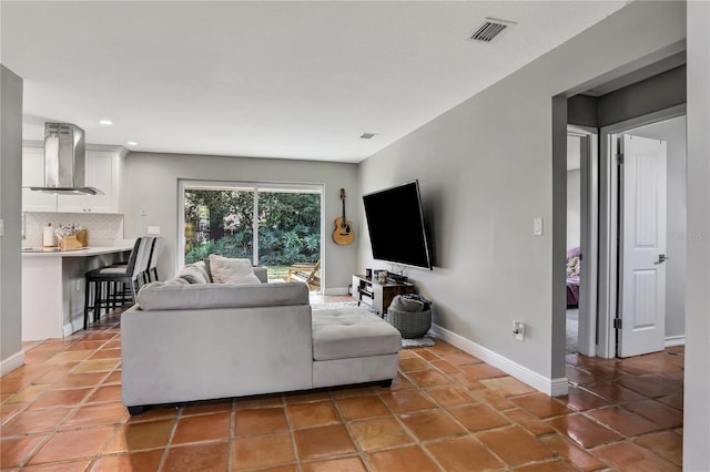 living room featuring light tile patterned floors