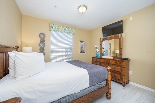 bedroom featuring light wood-type flooring