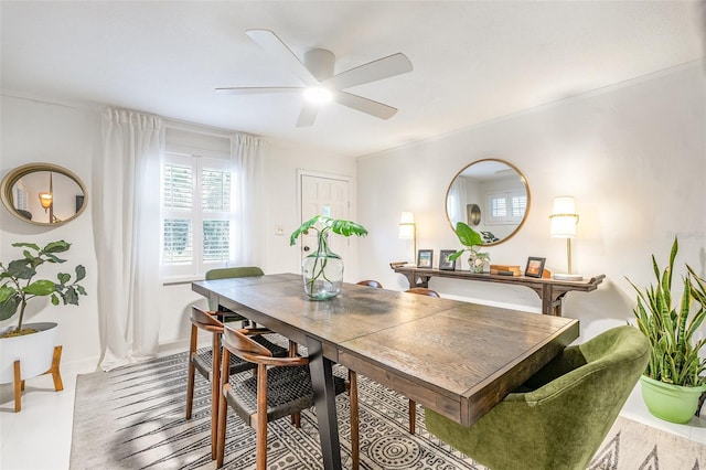 dining area with ceiling fan