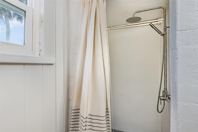 bathroom with a shower with shower curtain