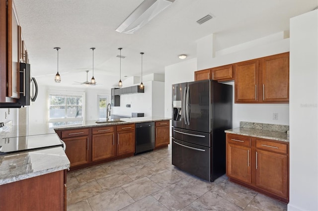 kitchen with pendant lighting, black dishwasher, sink, refrigerator with ice dispenser, and light stone countertops