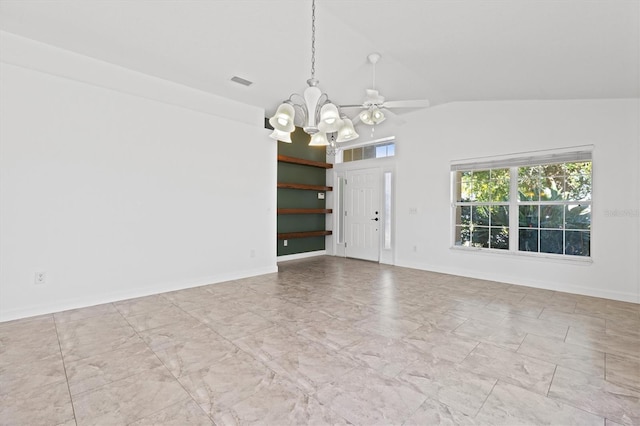 unfurnished room featuring lofted ceiling and an inviting chandelier