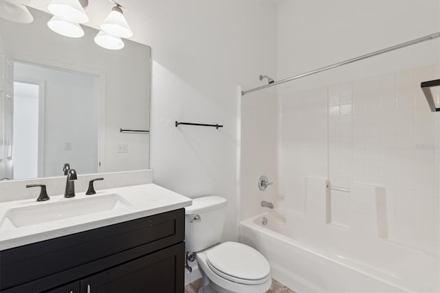 full bathroom with washtub / shower combination, vanity, and toilet