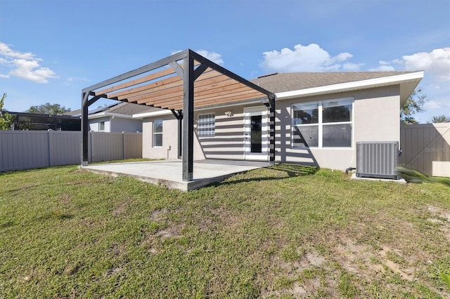 back of house with cooling unit, a pergola, a lawn, and a patio