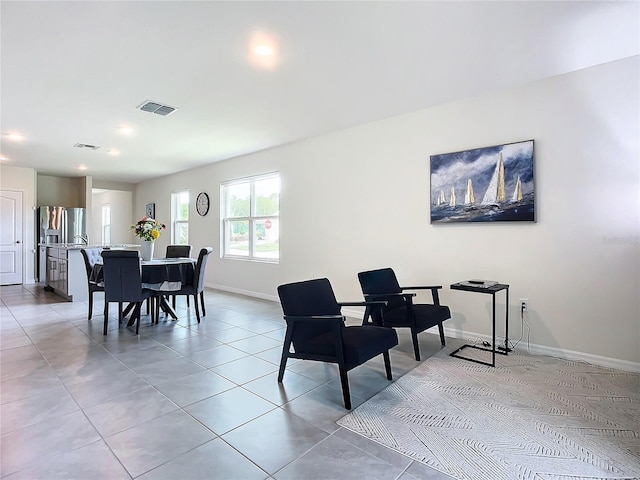 dining room featuring light tile patterned floors