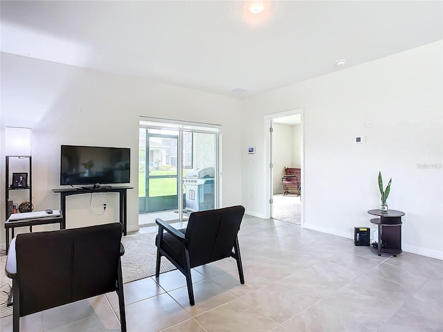 living room featuring light tile patterned floors