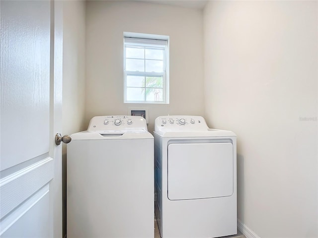 washroom featuring separate washer and dryer