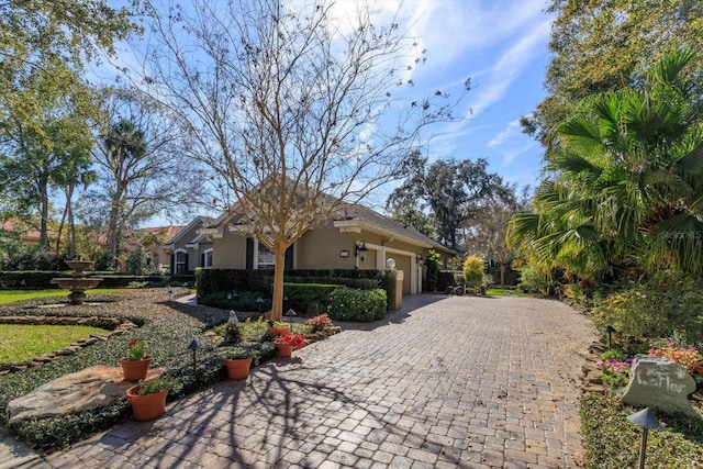 view of front of home with a garage