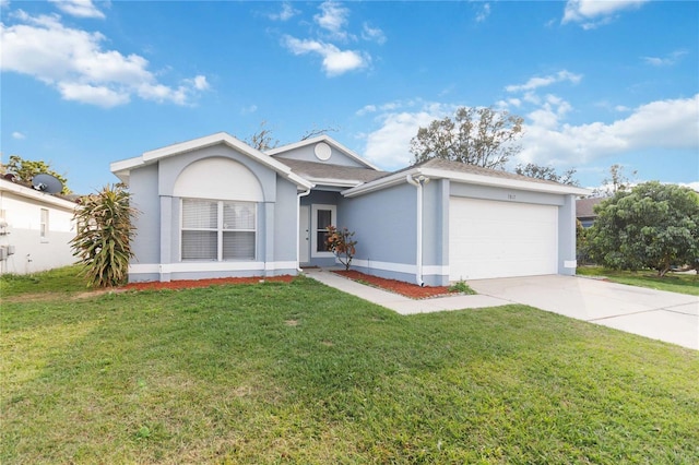 ranch-style home with a garage and a front yard