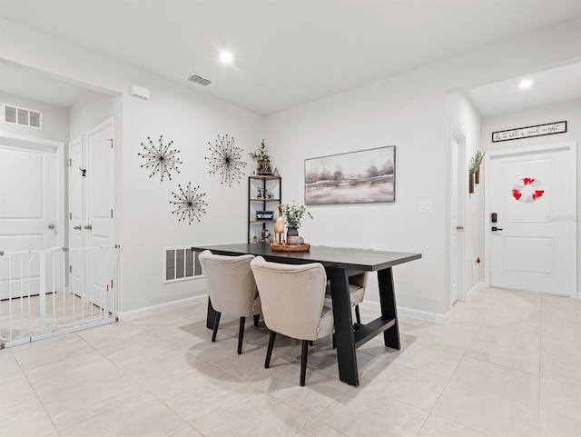 view of tiled dining space