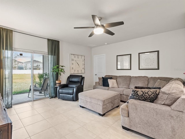 living room with light tile patterned flooring and ceiling fan