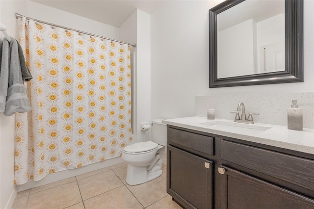 full bathroom featuring tile patterned flooring, vanity, toilet, and shower / tub combo with curtain