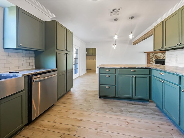 kitchen with tasteful backsplash, green cabinetry, light hardwood / wood-style flooring, stainless steel dishwasher, and pendant lighting