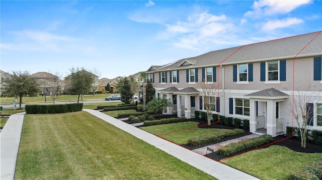 view of front facade with a front lawn