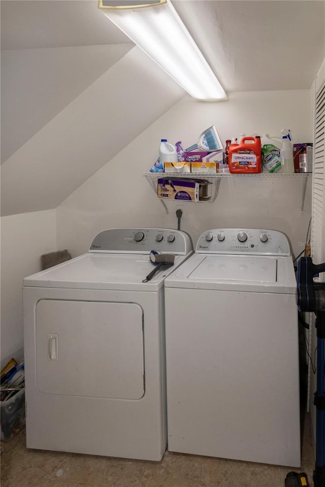 laundry area featuring washing machine and clothes dryer