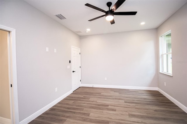 unfurnished room featuring hardwood / wood-style floors and ceiling fan