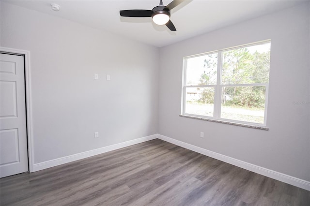 spare room featuring ceiling fan and wood-type flooring