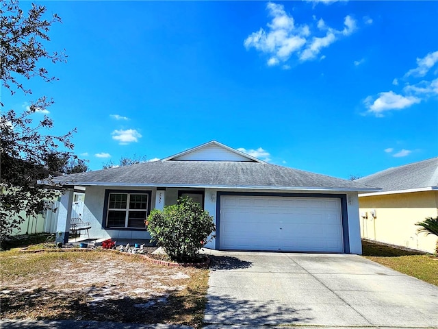 single story home featuring a garage