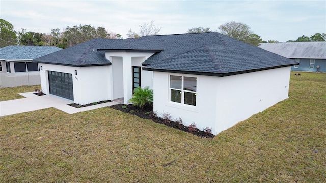 view of side of home featuring a garage and a lawn