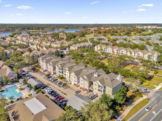 drone / aerial view with a water view