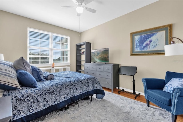 bedroom featuring hardwood / wood-style floors and ceiling fan