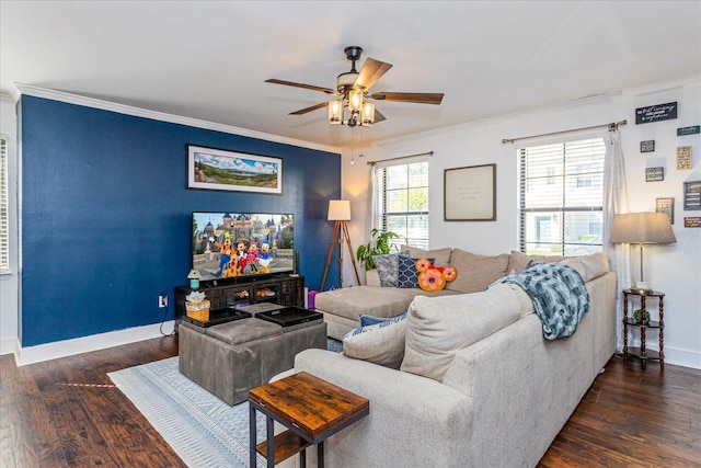 living room featuring dark hardwood / wood-style flooring, ornamental molding, and ceiling fan