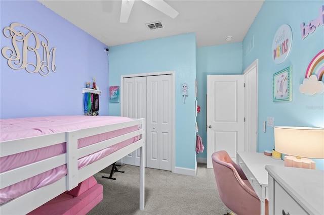 bedroom with ceiling fan and a closet