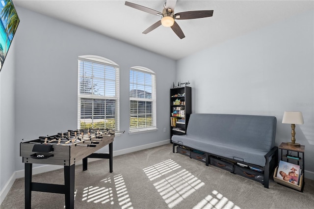 playroom featuring ceiling fan and carpet flooring