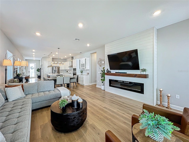 living room featuring light hardwood / wood-style flooring