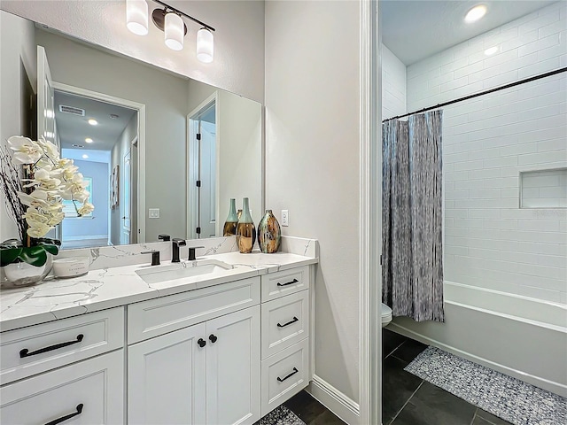 full bathroom with vanity, tile patterned floors, shower / bath combination with curtain, and toilet