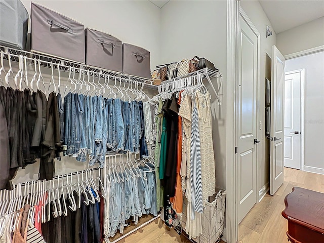 walk in closet featuring wood-type flooring