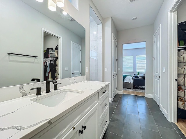 bathroom featuring vanity and tile patterned floors