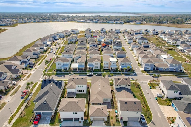 bird's eye view with a water view