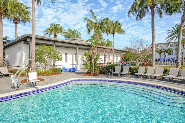 view of swimming pool featuring a patio area