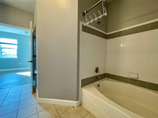 bathroom featuring a tub and tile patterned floors