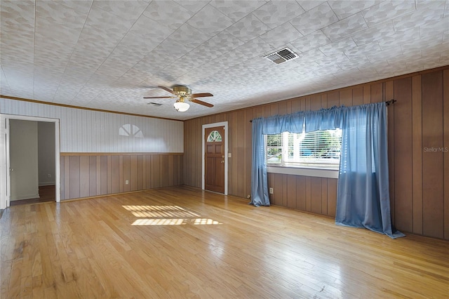 interior space with ceiling fan and light wood-type flooring