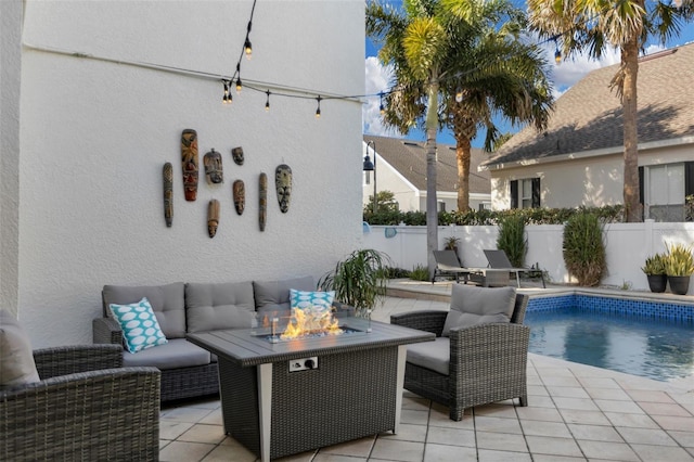 view of patio with an outdoor fire pit