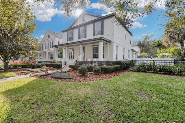 exterior space featuring a lawn and a porch