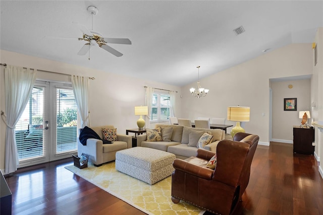 living room with french doors, ceiling fan with notable chandelier, light hardwood / wood-style floors, and vaulted ceiling