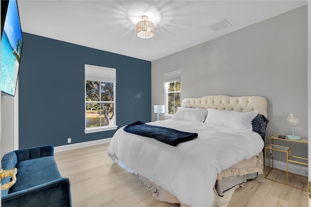 bedroom featuring light hardwood / wood-style floors