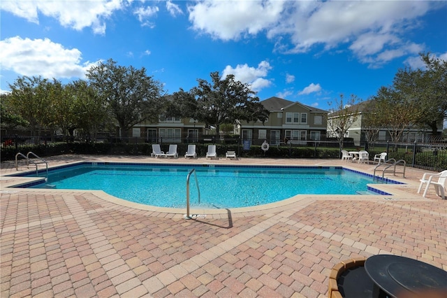 view of pool with a patio area