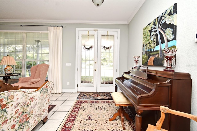 tiled foyer entrance with crown molding and french doors